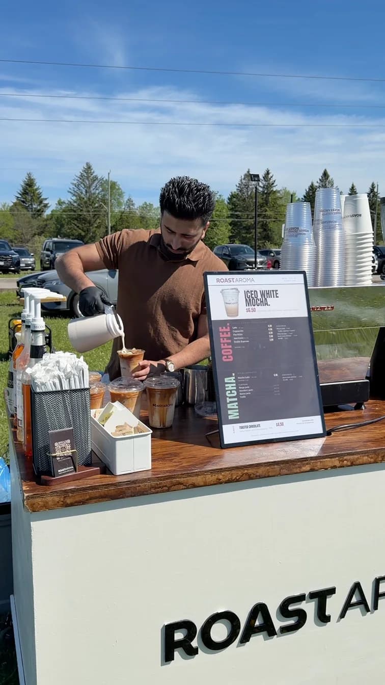 RoastAroma coffee cart set up for service outdoors